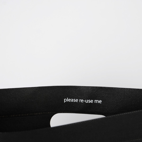 Påsar i Non Woven m. stansade handtag